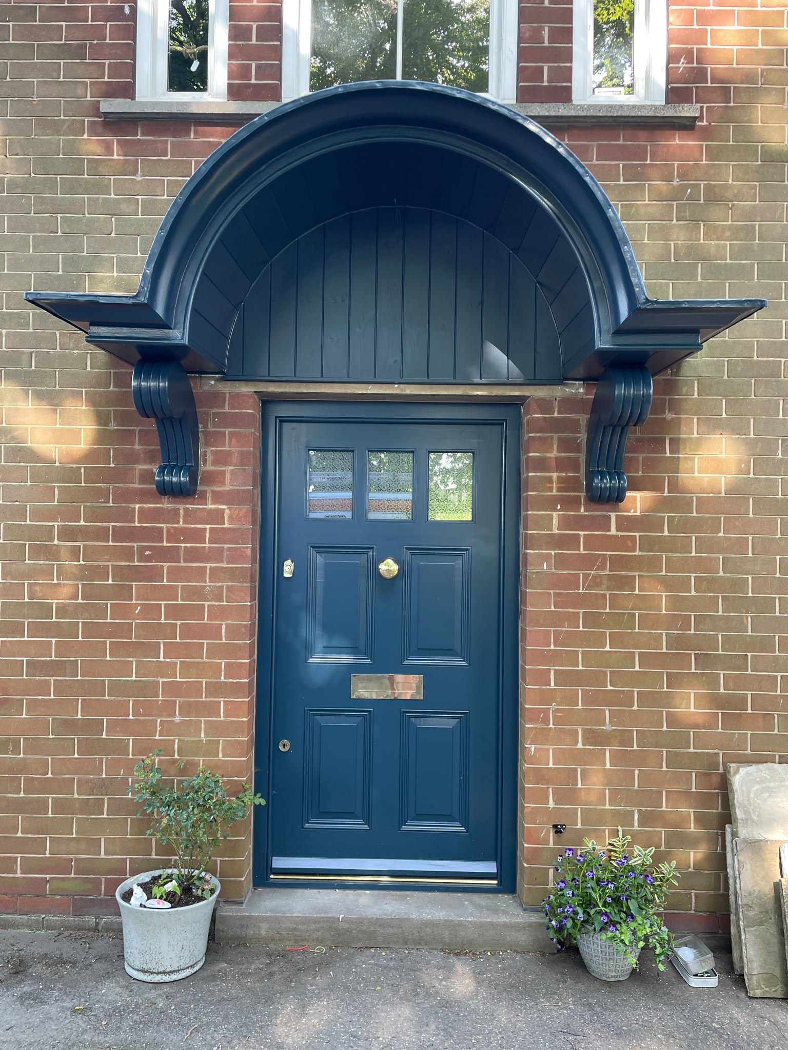 Door spraying: period front door and arched canopy sprayed deep navy