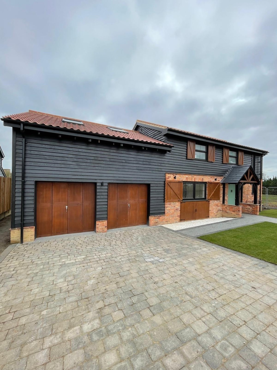 Garage door spraying: freshly sprayed garage door on a private home